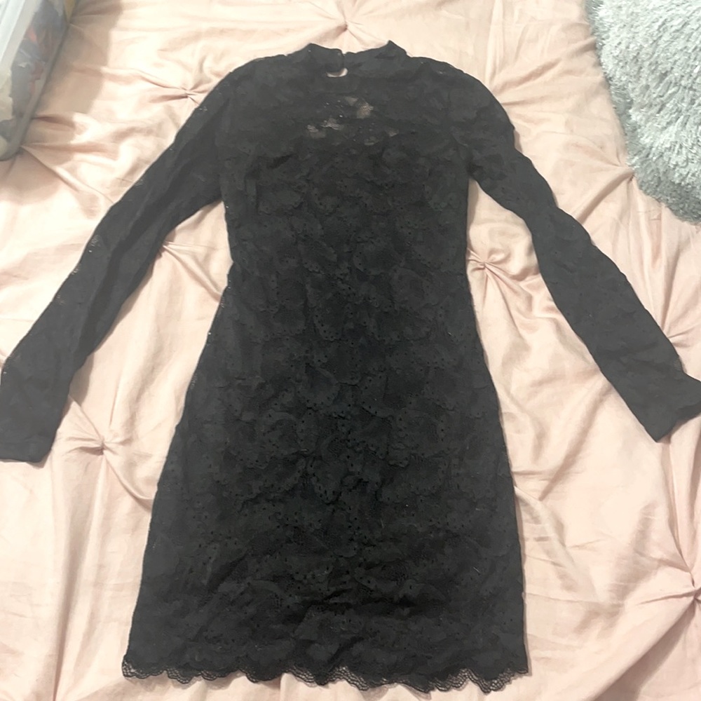Bebe lace black cocktail dress!  Long sleeve open back mini.
